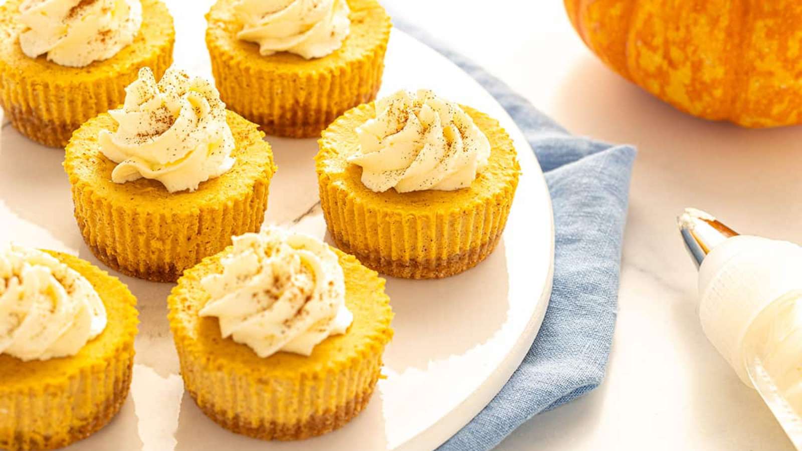 Mini Pumpkin Cheesecakes recipe by The Savory Cipolla.