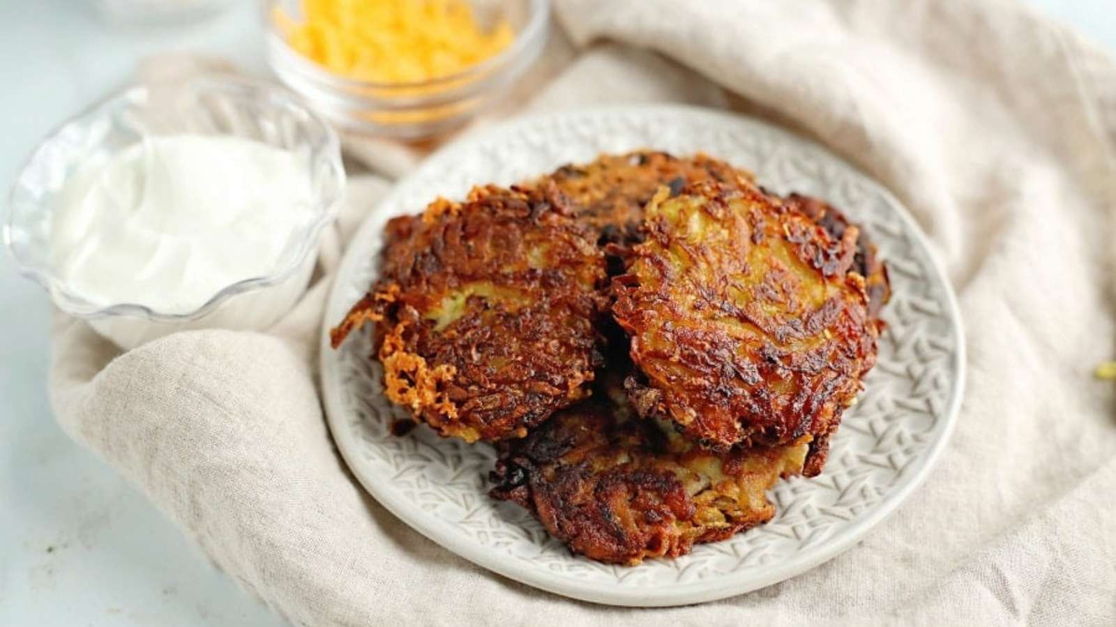 Cheesy Zucchini Potato Pancakes recipe by Kitchen Divas.