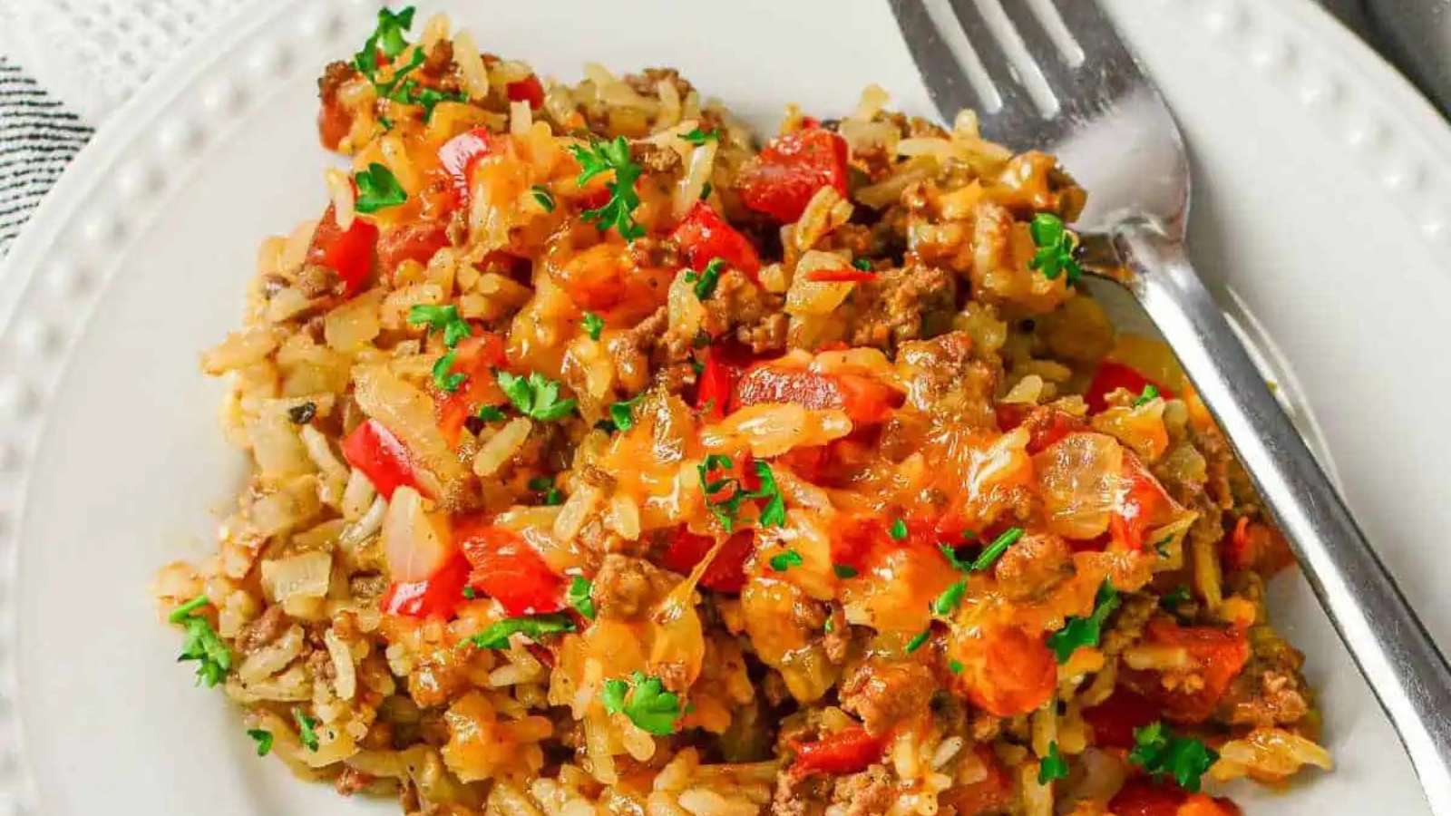 Easy Ground Beef And Rice Skillet recipe by One Hot Oven.