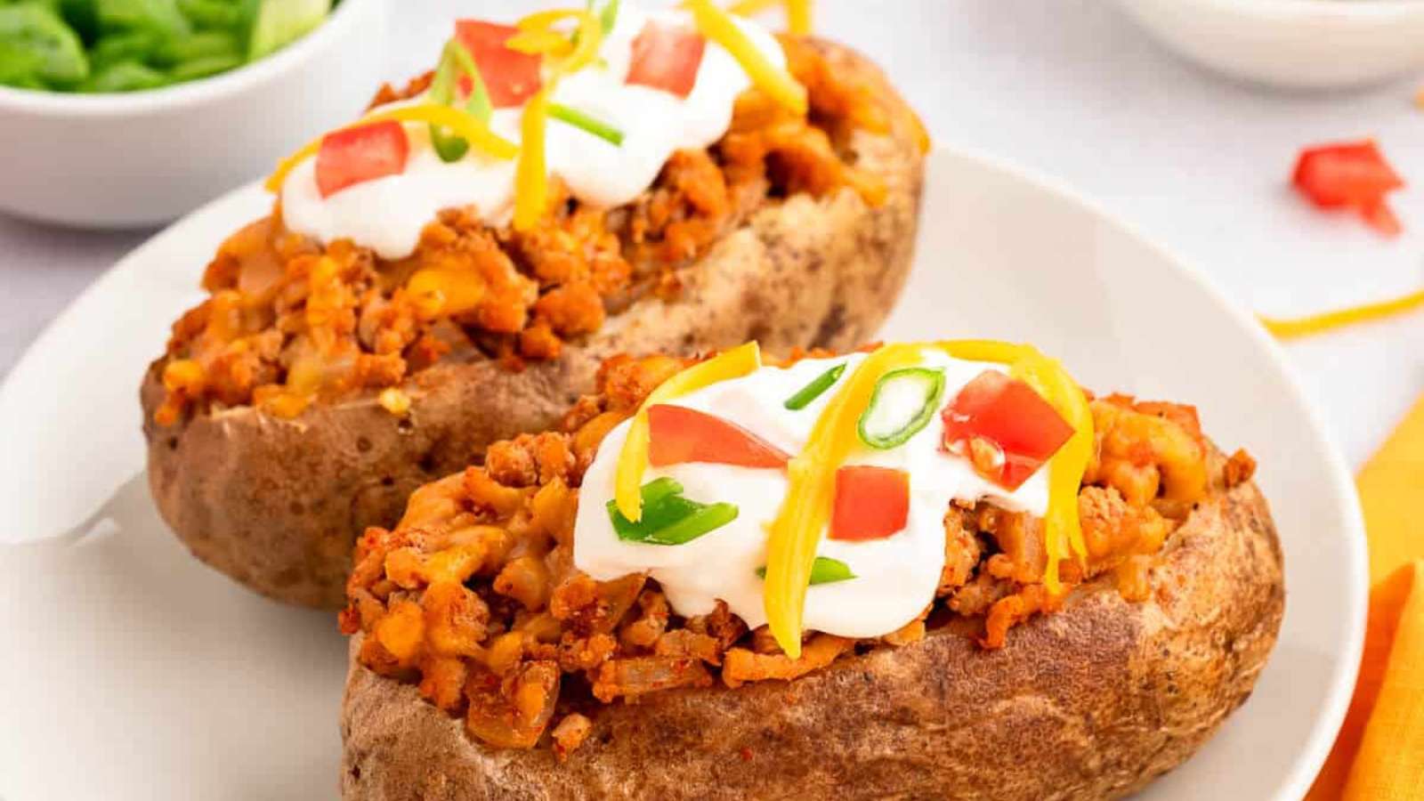 Chicken Taco Twice-Baked Potatoes recipe by Simply Stacie.