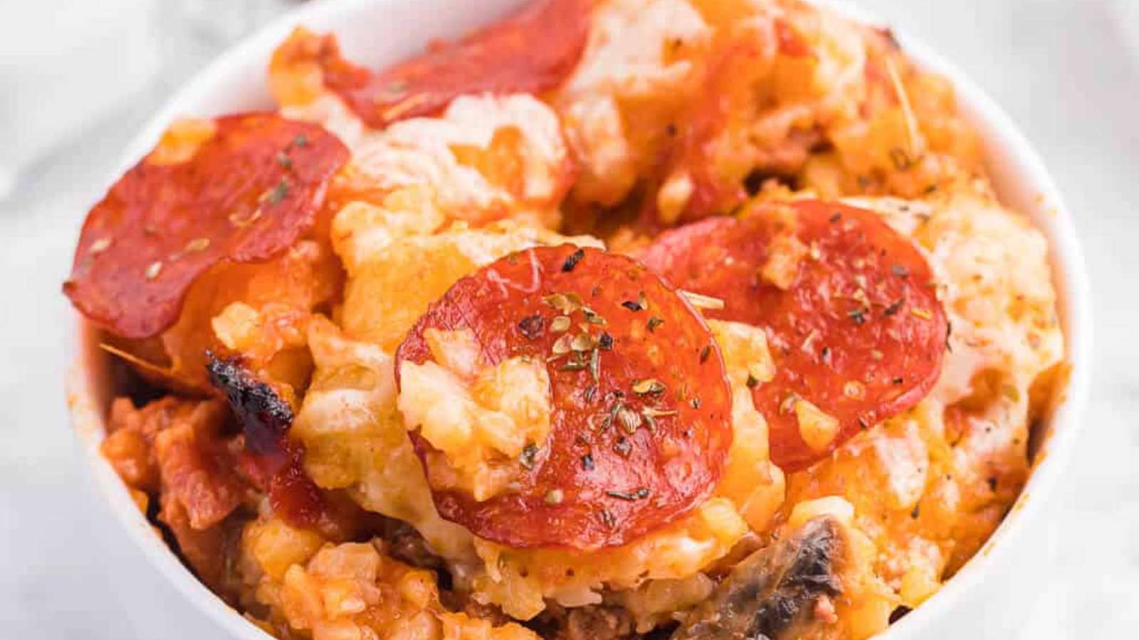 Pizza Tater Tot Casserole recipe by Simply Stacie.