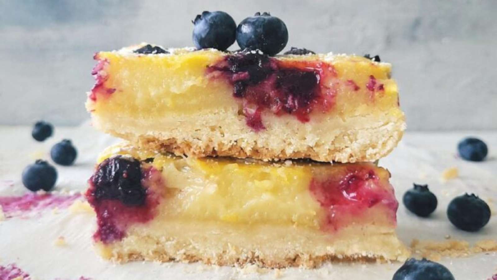 Blueberry Lemon Shortbread Bars recipe by Whisking Wolf.