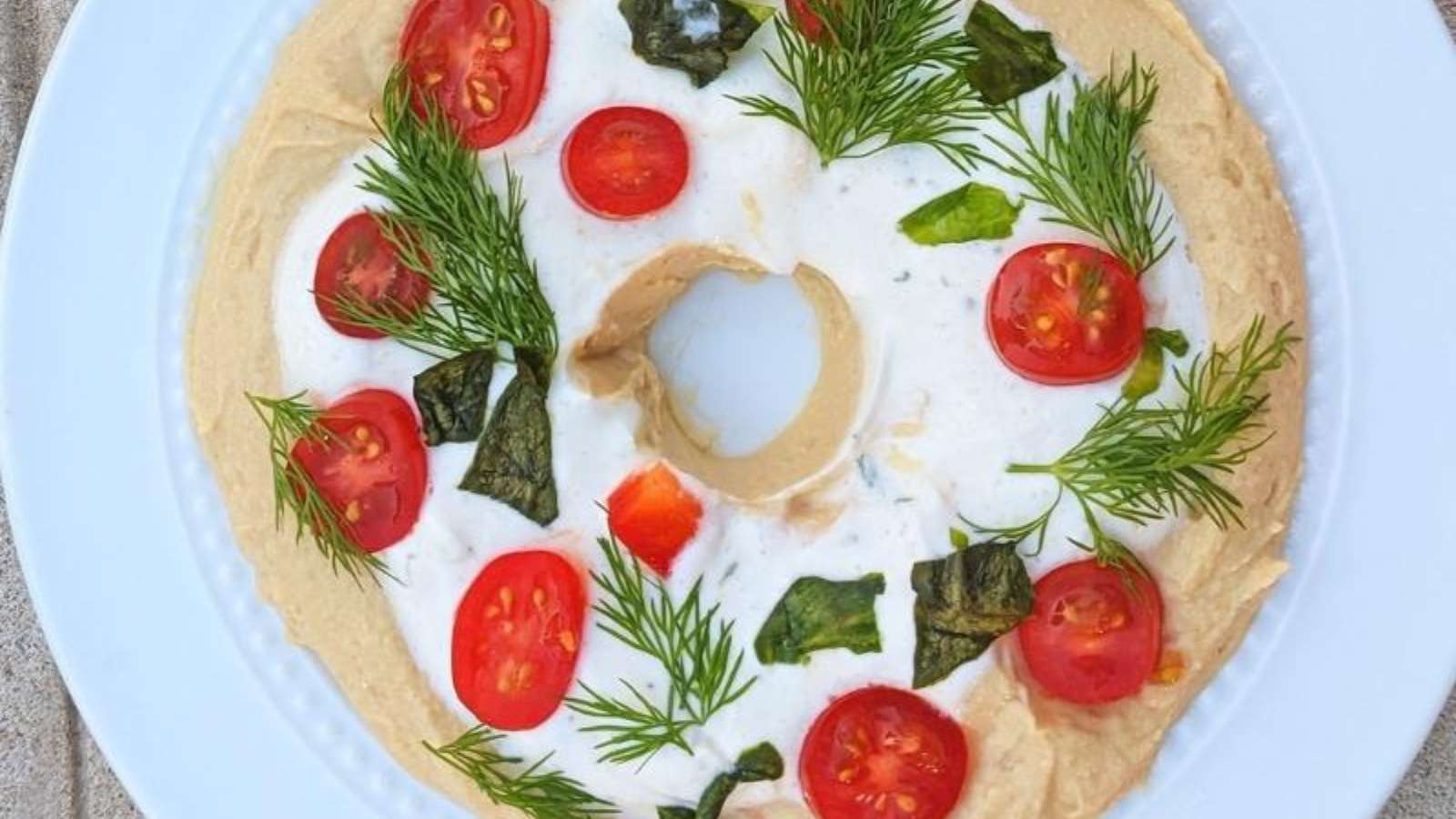 Holiday Hummus Wreath recipe by Health Beet.