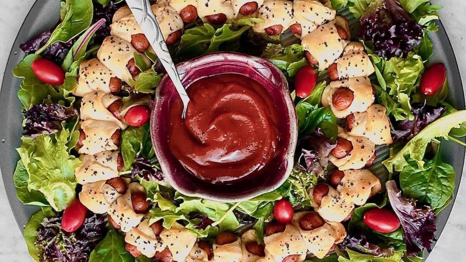 Pigs In A Blanket Wreath recipe by Quiche My Grits.