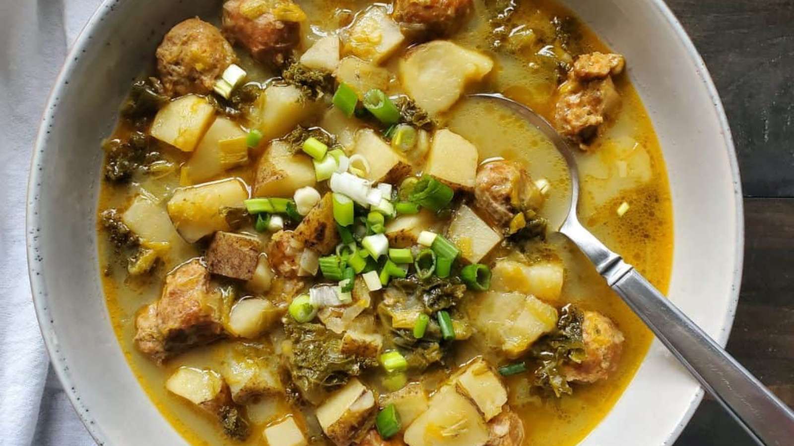 Slow Cooker Zuppa Toscana recipe by The Clean Happy Life.