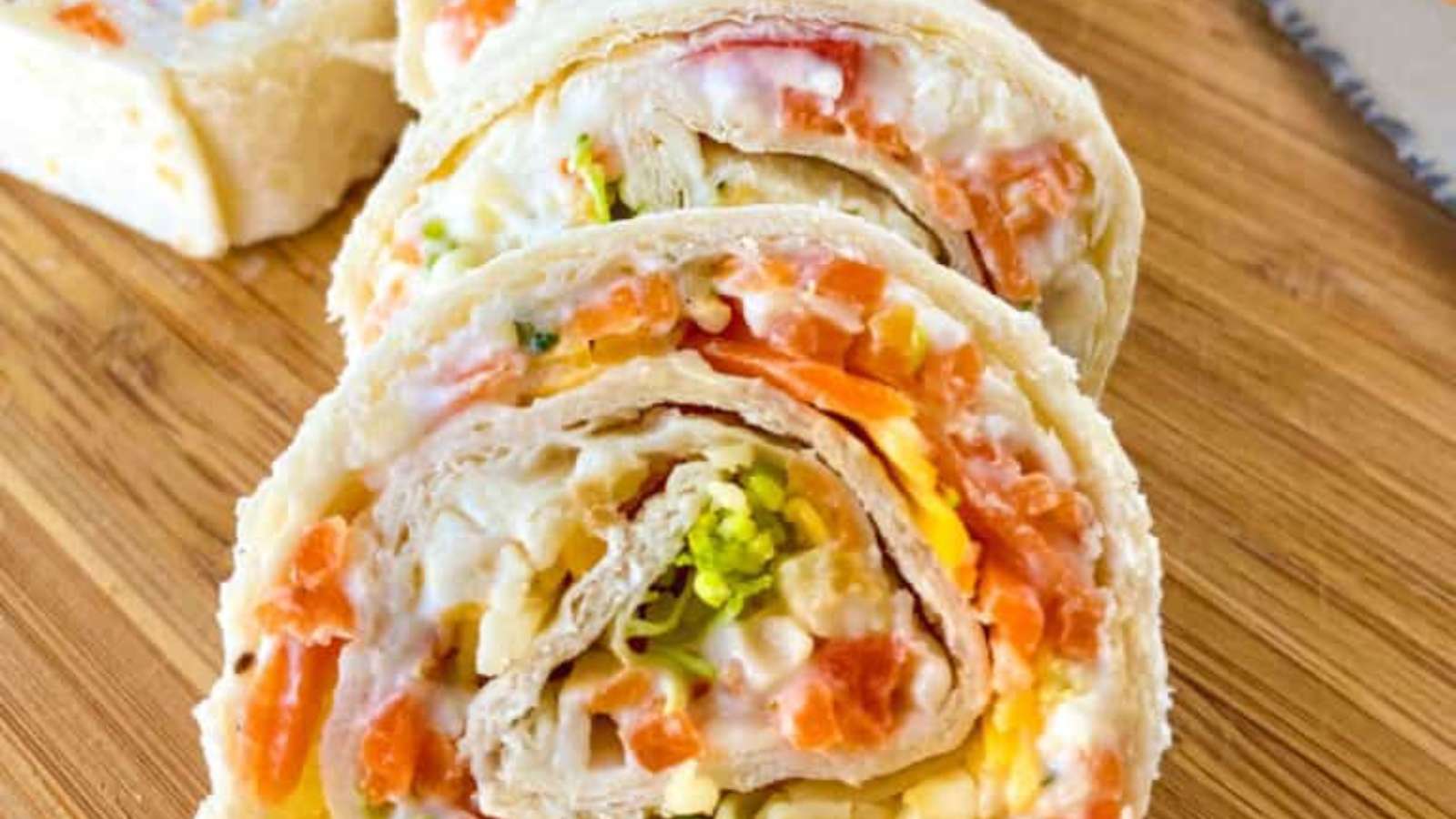 Veggie Ranch Pizza Pinwheels recipe by Whiskful Cooking.