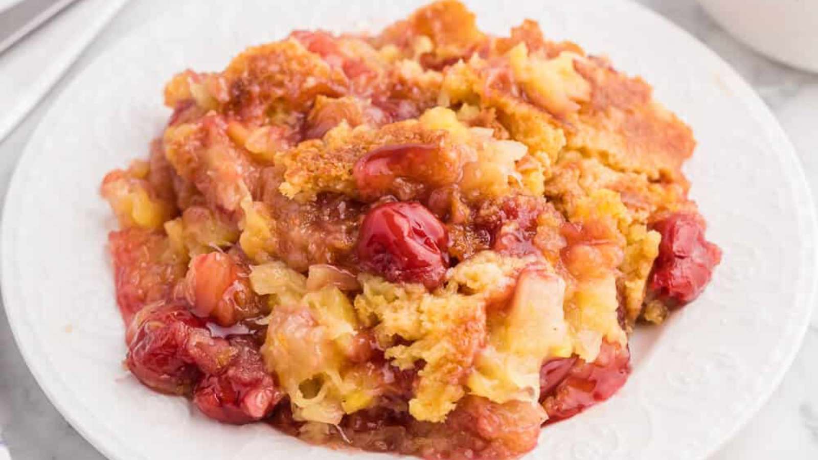 Cherry Pineapple Dump Cake recipe by Simply Stacie.