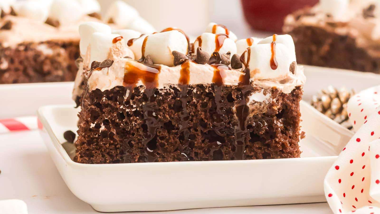 Hot Chocolate Poke Cake recipe by Tessie's Table.